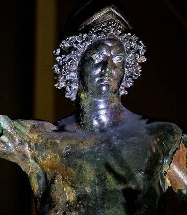 Bronze statue of the Roman god of war. The image shows head and chest.