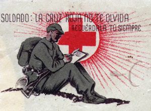 illustration of soldier writing a letter while seated on the ground. Behind him the red cross symbol withing a circle and rays radiating from the circle.