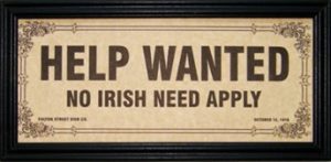 image of a help wanted sign with no Irish need apply written on it.
