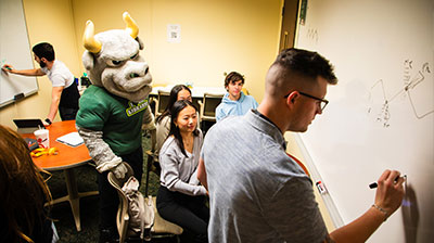 USF Graduate students studying together.